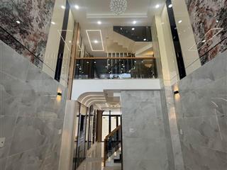 Nhà mới xây 5 tầng 2 mặt tiền trước sau xe hơi vào nhà. kinh doanh tốt