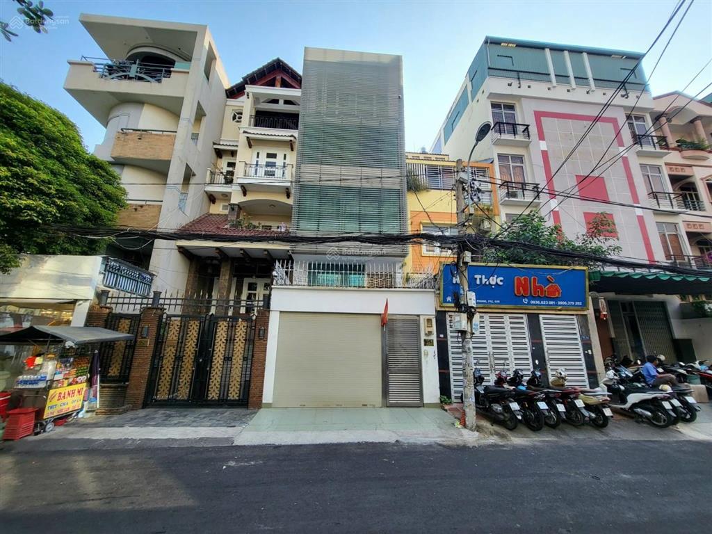 (hot)hạ 4 tỷ bán tòa mt giải phóng 5,6x17m  1 hầm 6 lầu nhà cứng đẹpvị trí sân bay t1chỉ 19,8 tỷ