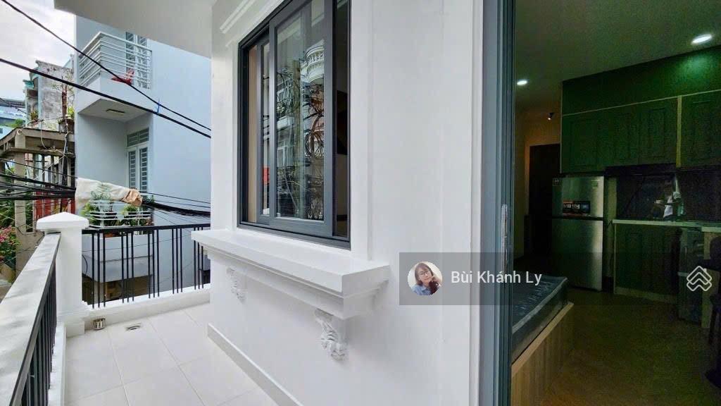 Siêu phẩm phú nhuận hẻm xe hơi huỳnh văn bánh 5 tầng thang máy, ngang 5m, hđ 50tr/tháng