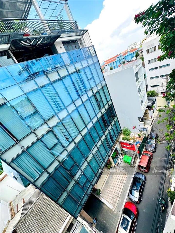 Tôi cần bán toà nhà văn phòng trục chính nguyễn văn trỗi hầm thang máy + 7 tầng xịn.