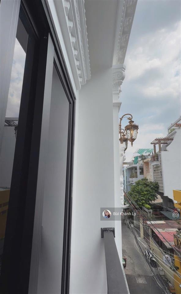 Nhà đẹp thang máy xịn50m(4 x 12,5)m 6 tầng bạch đằng ngã tư hàng xanh liền kề q1 q2