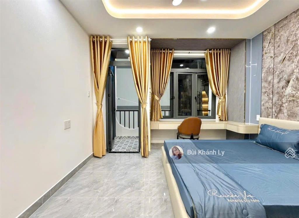 Bán nhà phan đăng lưu phú nhuận 50m 4 tầng thang máy nở hậu