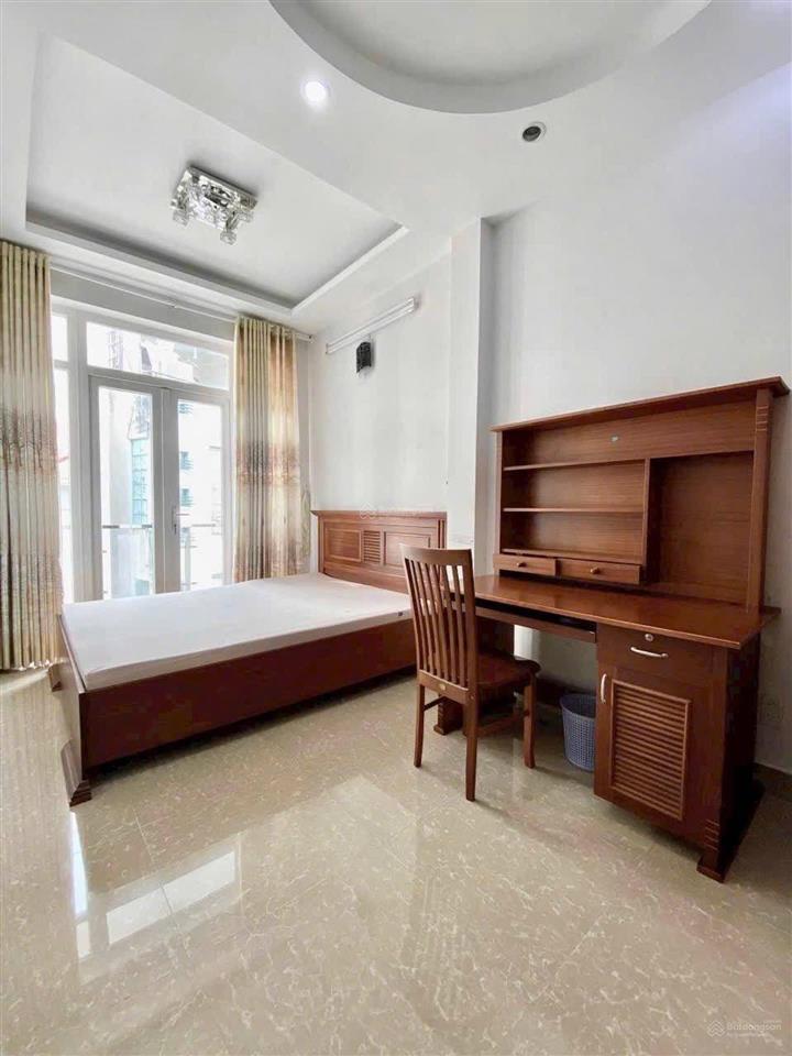 Bán nhà hxh phan đình phùng 55m² 4 tầng btct giáp quận 1