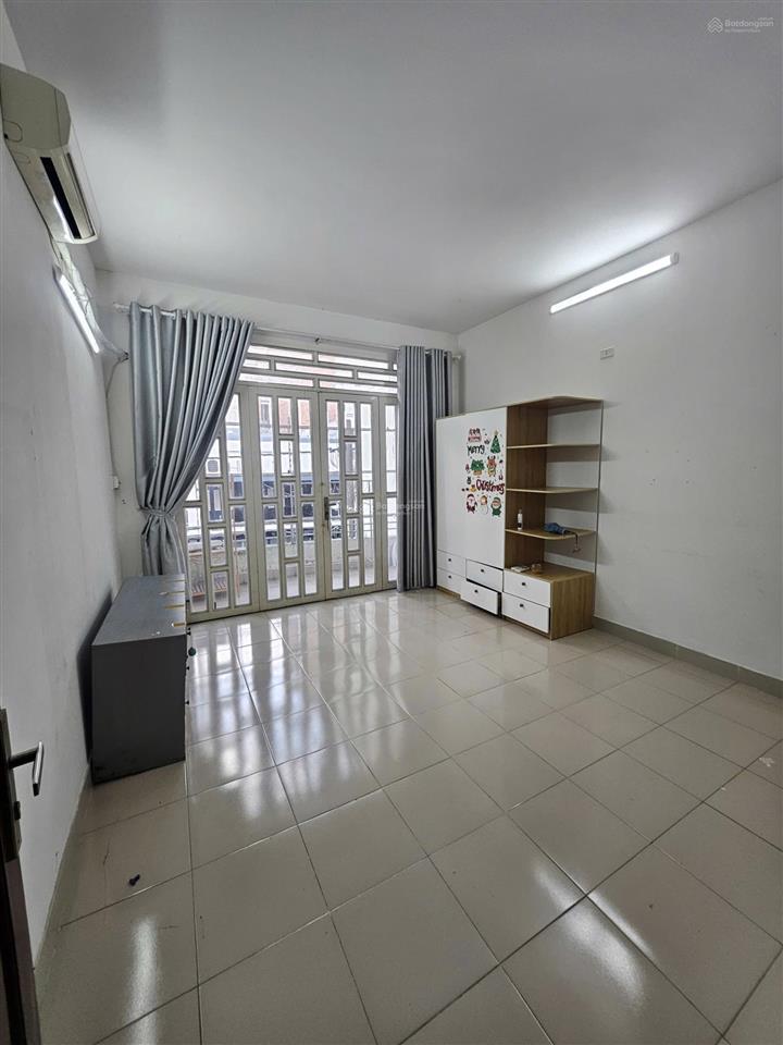 Nhà đường thông xe hơi khu miếu gò xoài 4x8m 1 lầu