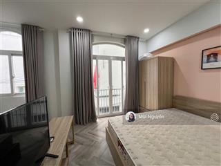 Dòng tiền 50tr/th, nhà 2 mặt hẻm trước sau huỳnh văn bánh, pn  dt 4.9x13m, 5 tầng 9pn  10.9 tỷ
