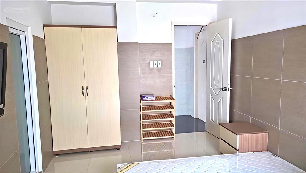 Bán chdv mt đường lâm văn bền tt quận 7  8 tầng  hầm thang máy 51 phòng 12x18m thu nhập 250tr/th