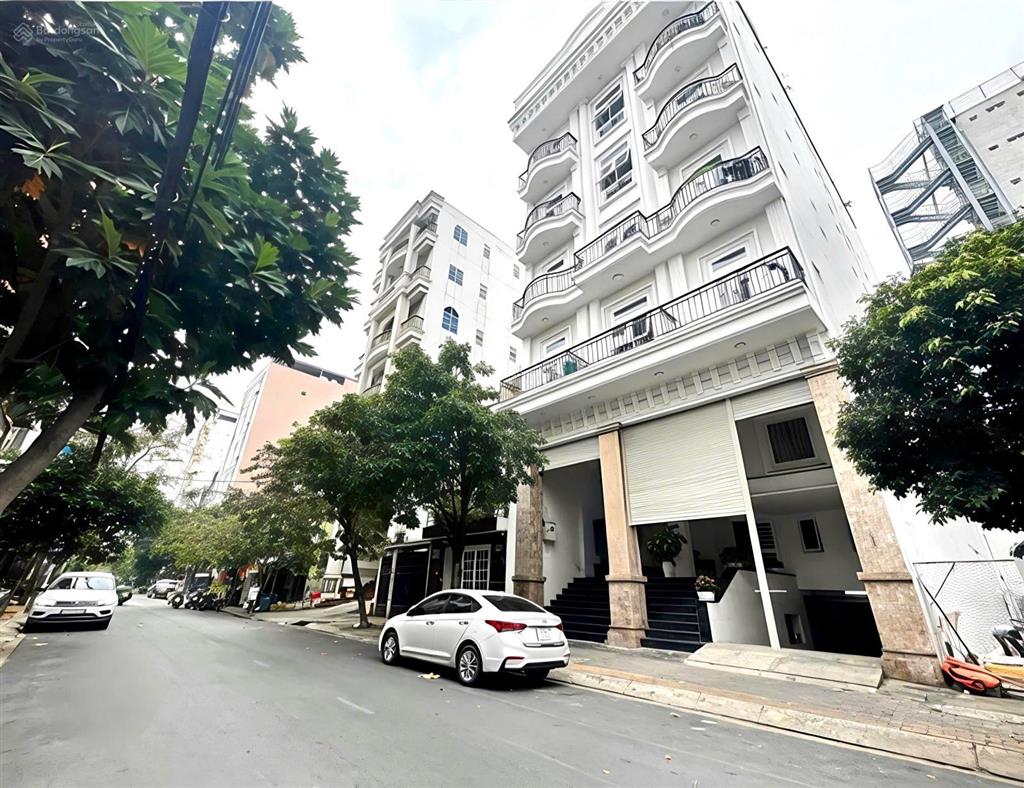 Bán chdv mt đường lâm văn bền tt quận 7  8 tầng  hầm thang máy 51 phòng 12x18m thu nhập 250tr/th