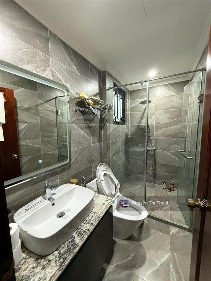 Bán nhà thịnh hào đống đa 55m2 8 tầng mt 3.9m giá nhỉnh 21 tỷ lô góc ô tô thang máy