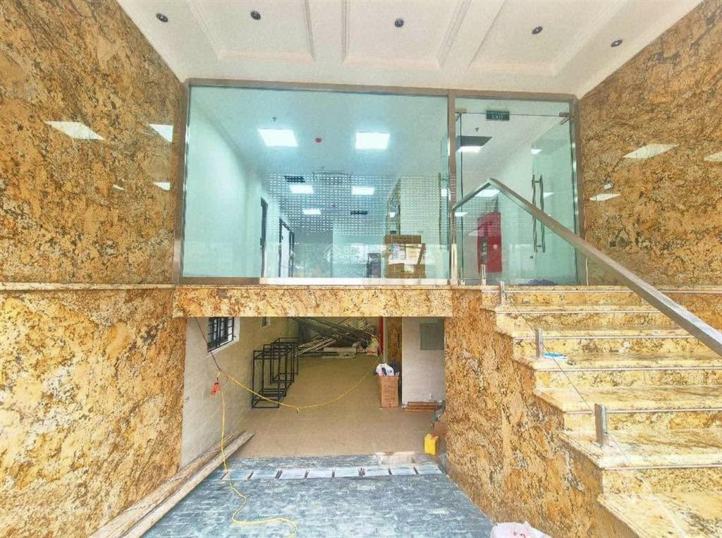 Toà nhà văn phòng xã đàn  lô góc  9 tầng thang máy  ôtô tránh  kinh doanh  dòng tiền khủng 