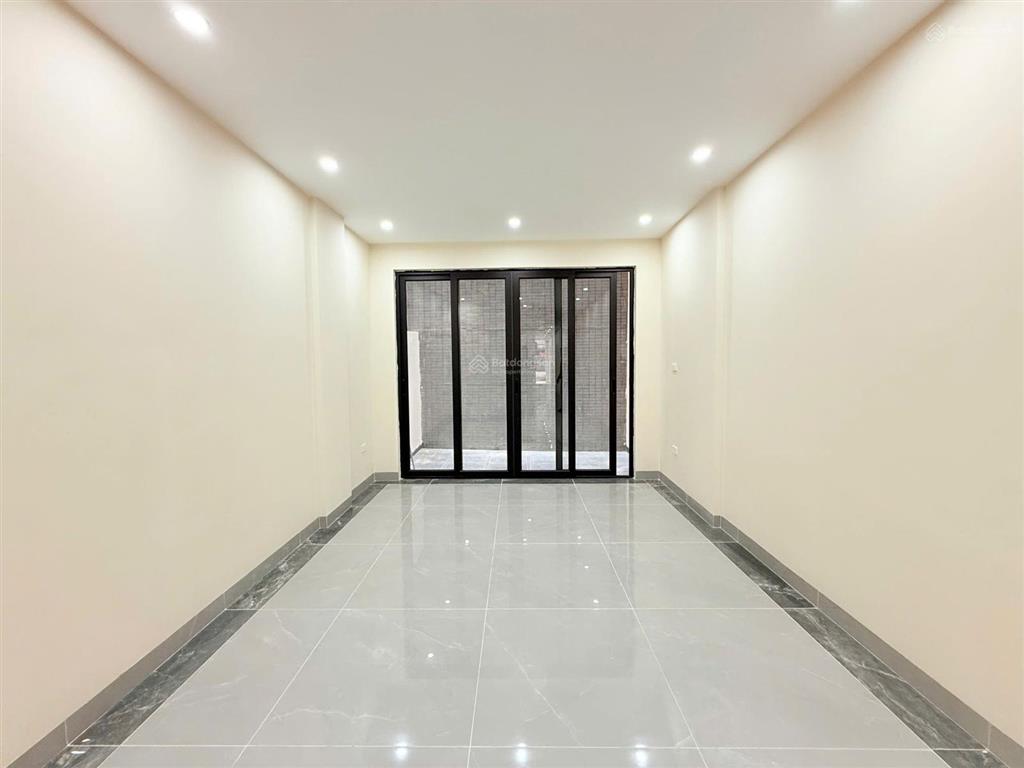 Rẻ như cho, bán nhà xây mới vào ở ngay phố đoàn thị điểm 83,9m2*6t, thang máy ô tô, sát mặt phố