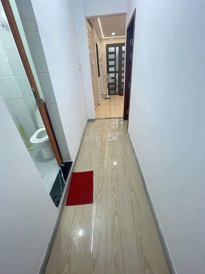 nhà mới ở ngay bùi đình túy.gần chợ bà chiểu.3 phòng ngủ 72m tdtsd