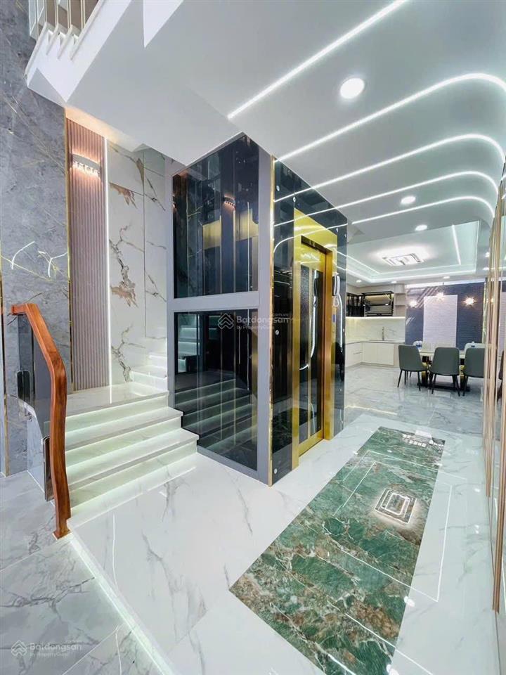 Nhà phố xây mới sau căn mặt tiền đường 8m có lề. dt 4 x18m xây 4 tầng có thang máy lâm thị hố