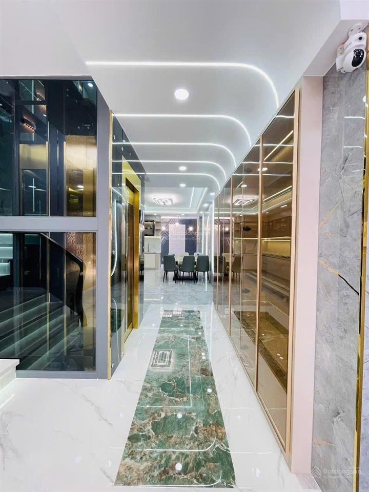 Nhà phố xây mới sau căn mặt tiền đường 8m có lề. dt 4 x18m xây 4 tầng có thang máy lâm thị hố