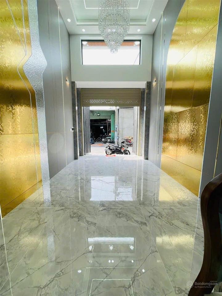 Nhà phố xây mới sau căn mặt tiền đường 8m có lề. dt 4 x18m xây 4 tầng có thang máy lâm thị hố