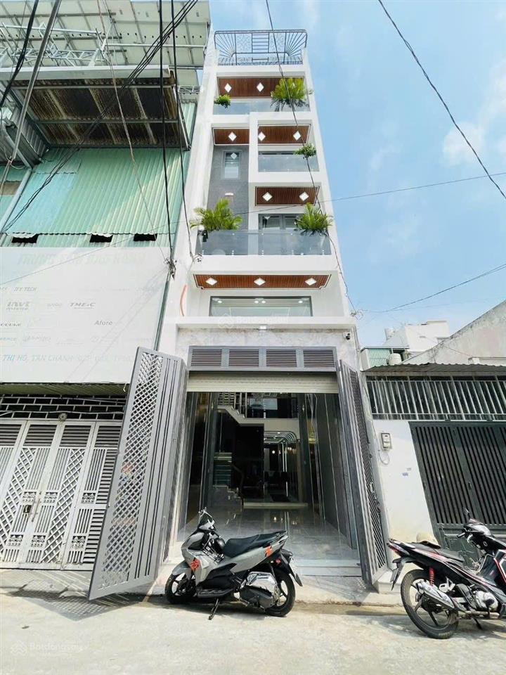Nhà phố xây mới sau căn mặt tiền đường 8m có lề. dt 4 x18m xây 4 tầng có thang máy lâm thị hố