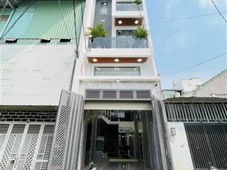 Nhà phố xây mới sau căn mặt tiền đường 8m có lề. dt 4 x18m xây 4 tầng có thang máy lâm thị hố