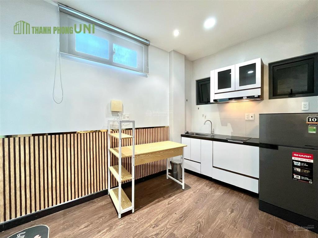 Căn hộ tone gỗ phù hợp cho bạn nào thích nhà sạch sẽ, yên tĩnh  nơ trang long