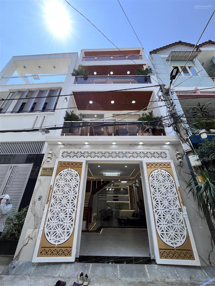 Nhà phố q7, nhà ngang 5m, hẻm xe hơi thông 2 đầu, 1 trệt 2 lầu, full nt, giá 10,6 tỷ.