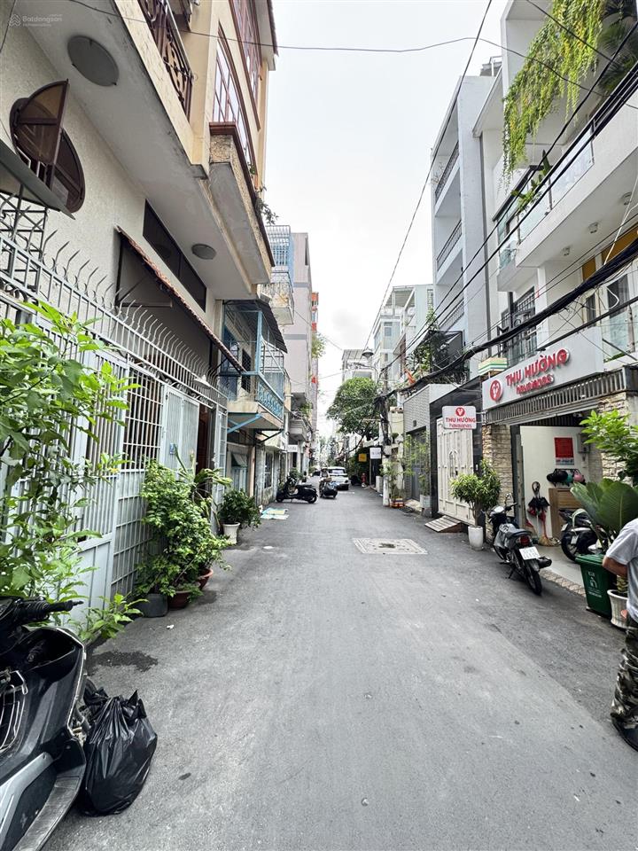 Tòa nhà hầm 7 tầng ngay hẻm xe hơi lê văn sỹ, q3, dt 4,5m x 17m nở 5m. giá chỉ 23 tỷ rất hiếm q3