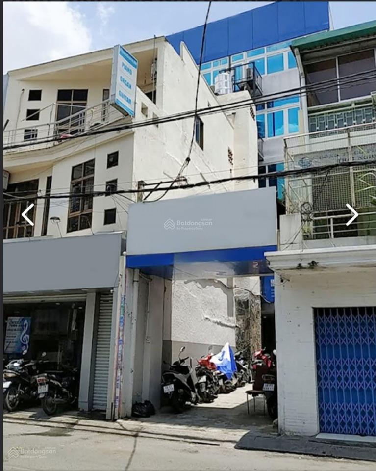 Tòa nhà hơn 1.000m2  ngang 8m ốp full kính  số 10 trương quốc dung, quận phú nhuận