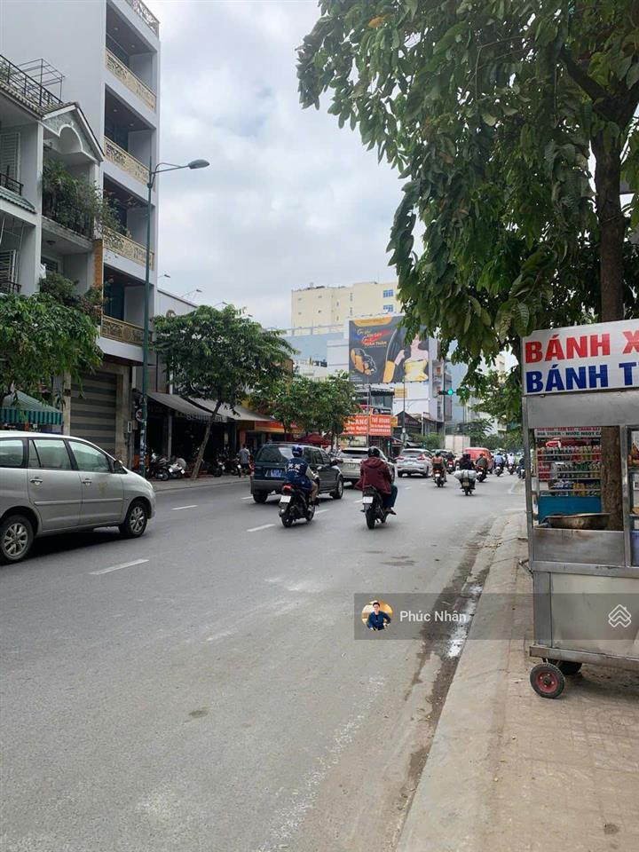 Tòa building góc 2mt  422b trường sa (đoạn 2 chiều)  (14x19m, hầm 8 tầng) hđt 275 triệu  65 tỷ