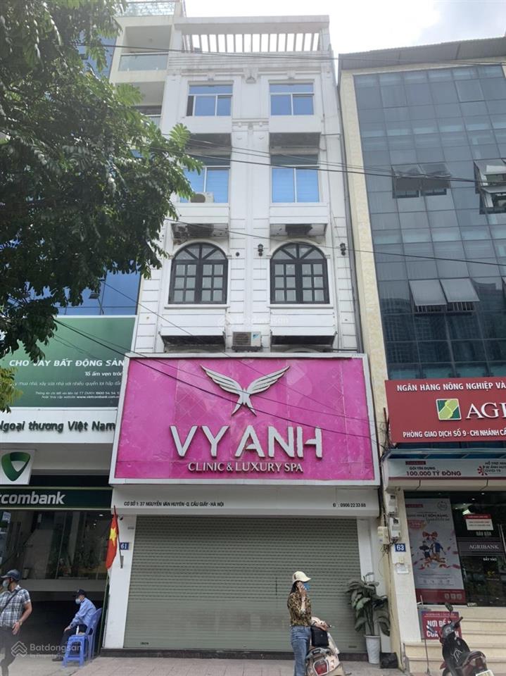 Cho thuê nhà mặt phố nguyễn văn huyên  cầu giấy  hn 70m2 6 tầng mt 5.5m. thông sàn. giá 65tr