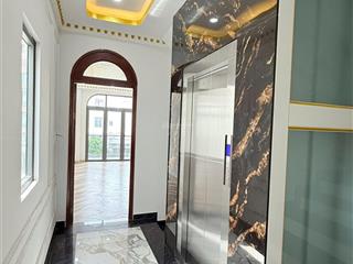 Nhà mặt tiền 6 tầng  thang máy full nội thất q6