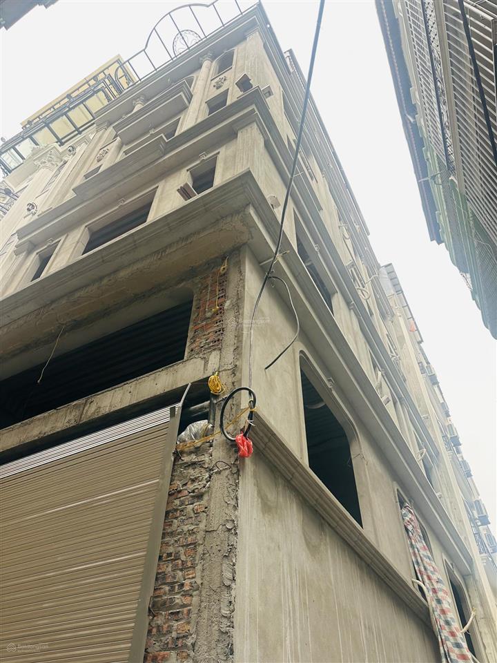 Tôi bán toà nhà 7 tầng thang máy phố tô vĩnh diện, 65m2  7 tầng lô góc 2 mặt tiền giá 35 tỷ