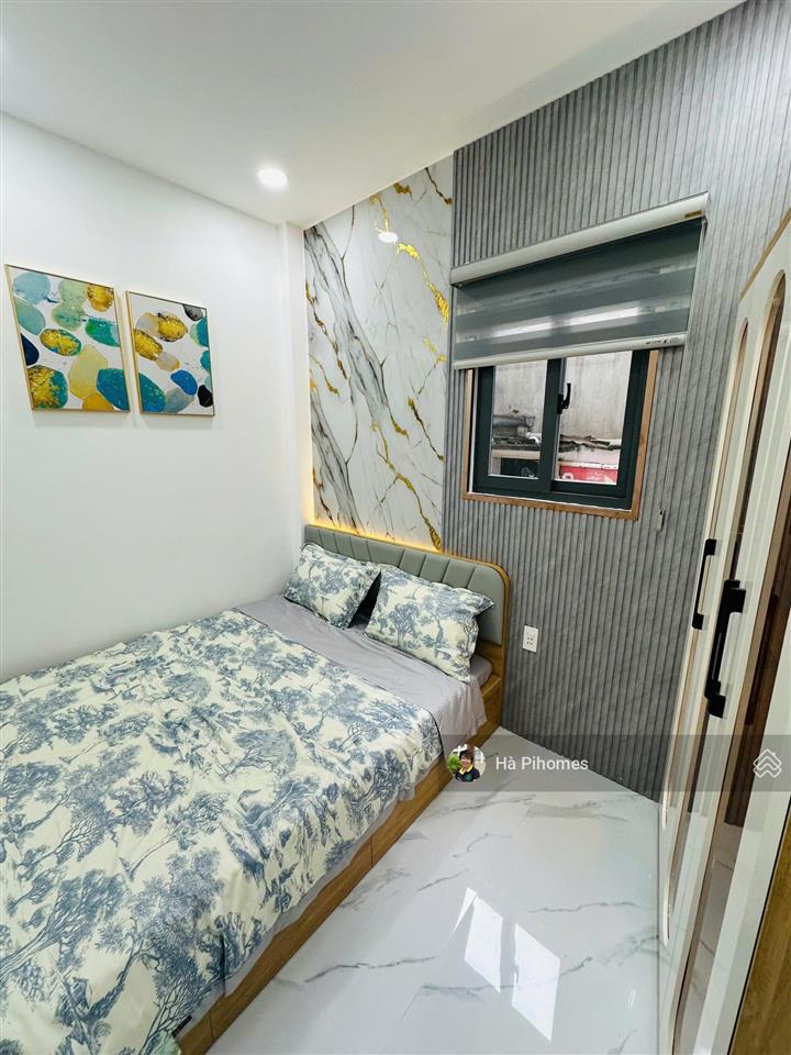 Bán nhanh nhà phố mới đường bùi đình túy 1 trệt 3 lầu 4pn sổ sẵn