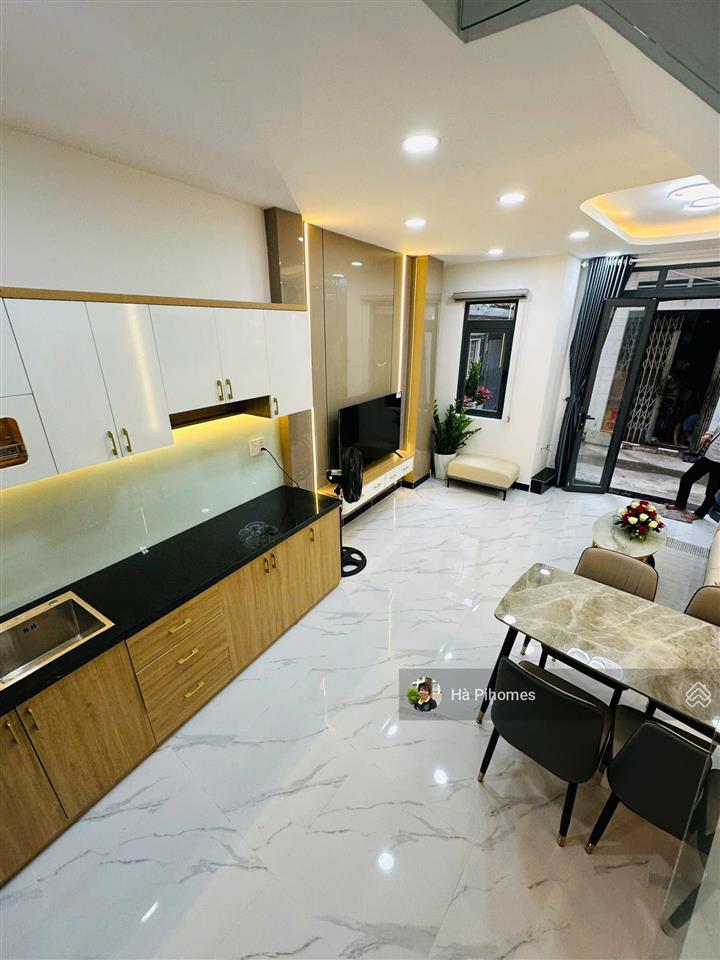 Bán nhanh nhà phố mới đường bùi đình túy 1 trệt 3 lầu 4pn sổ sẵn