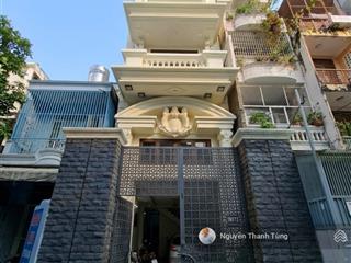 Bán gấp tòa nhà 7 tầng làm căn hộ dịch vụ quận phú nhuận  cn 97m2 (4.5x19) hẻm xe hơi 7 chỗ vô nhà