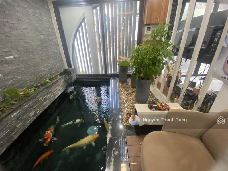 Bán gấp biệt thự mini quận phú nhuận  ngang lớn bề thế 7.5m  5 tầng có thang máy, hồ cá koi đẹp