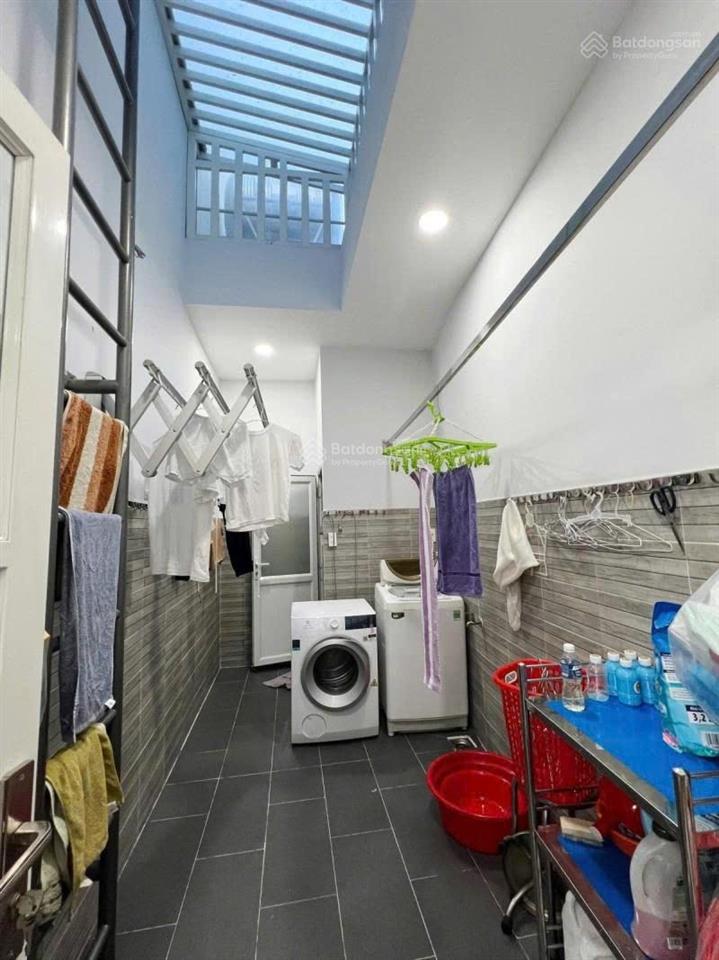 Bán gấp nhà huỳnh văn bánh, phú nhuận  100m2 (4 x 15) nở hậu chữ l 14m  chỉ 10m ra mặt tiền