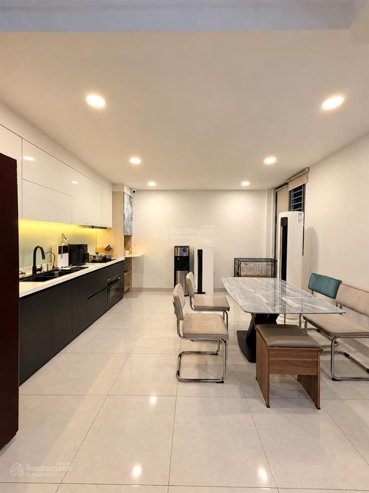 Bán gấp nhà có gara ô tô đường phạm văn hai  cn 66m2 (4.9 x 15)  4 tầng 5 phòng ngủ tặng nội thất
