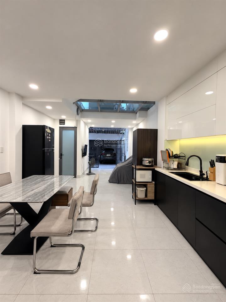 Bán gấp nhà có gara ô tô đường phạm văn hai  cn 66m2 (4.9 x 15)  4 tầng 5 phòng ngủ tặng nội thất