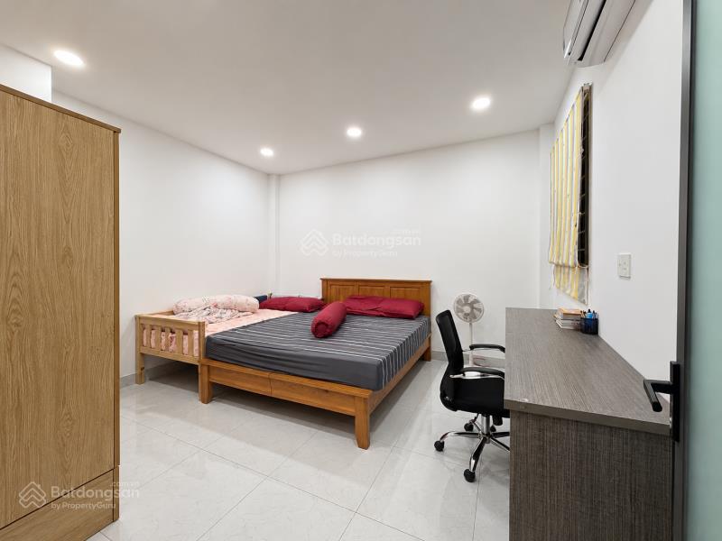 Bán gấp nhà có gara ô tô đường phạm văn hai  cn 66m2 (4.9 x 15)  4 tầng 5 phòng ngủ tặng nội thất