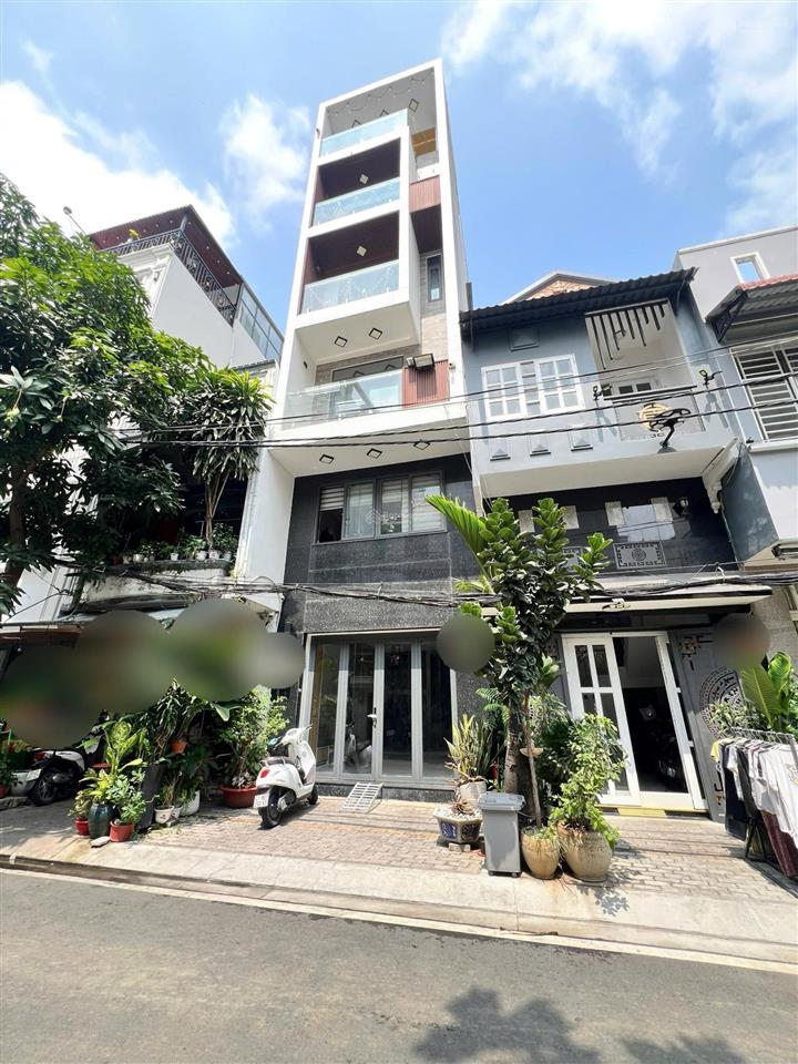 Bán nhà mặt tiền đường số quận 7. ngang 4m dài 20m. 1 trệt 4 lầu sân thượng. 12,8 tỷ