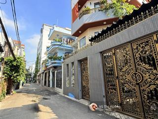 Quận 7  nhà 4 tầng  502 htp  4.5m * 11m  7 tỷ 5  ngay nhà thi đấu q7