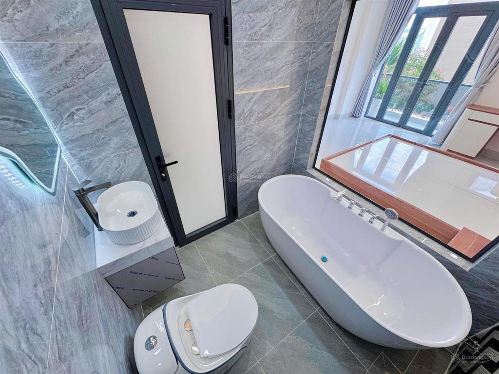 Đáng sống  kdc đông bộ  đường trước nhà 20m thông  1 lửng 4 lầu (6pn, 7nvs)  hương lộ 2 nối dài