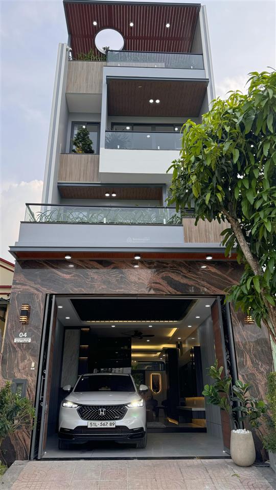 Nhà đường nhựa 16m, vị trí đẹp, view thoáng, có thang máy, gara ô tô, ngang 5m, dài 18m