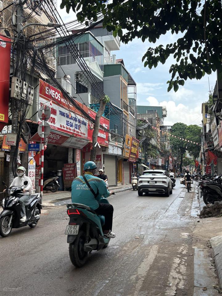 Mặt phố vĩnh hưng 5 tầng  75m2  18 tỷ  vỉa hè rộng  ô tô dừng đỗ