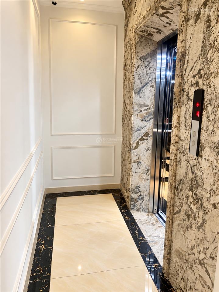 Nhà tôn đức thắng 50m2 mới coong lô góc8 tầng thang máy ô tô tránh ngõ thông full nội thất