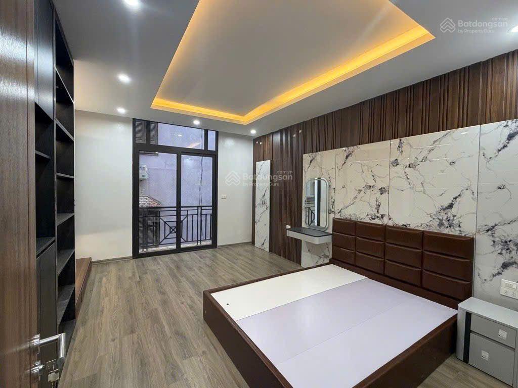 Giảm 1 tỷ  70m trần duy hưng  7 tầng + 1 tum  thang máy mặt tiền 4,5m ô tô vào nhà, kd đỉnh