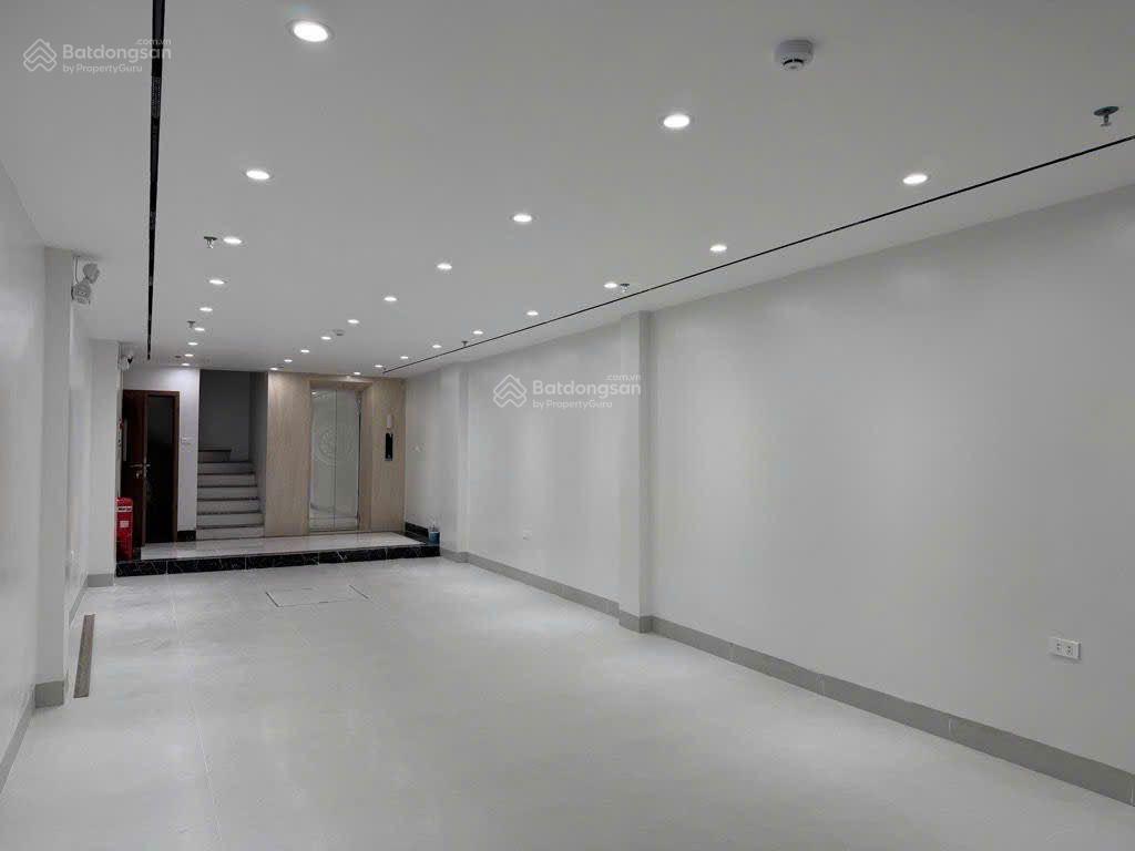 Giảm 1 tỷ  70m trần duy hưng  7 tầng + 1 tum  thang máy mặt tiền 4,5m ô tô vào nhà, kd đỉnh