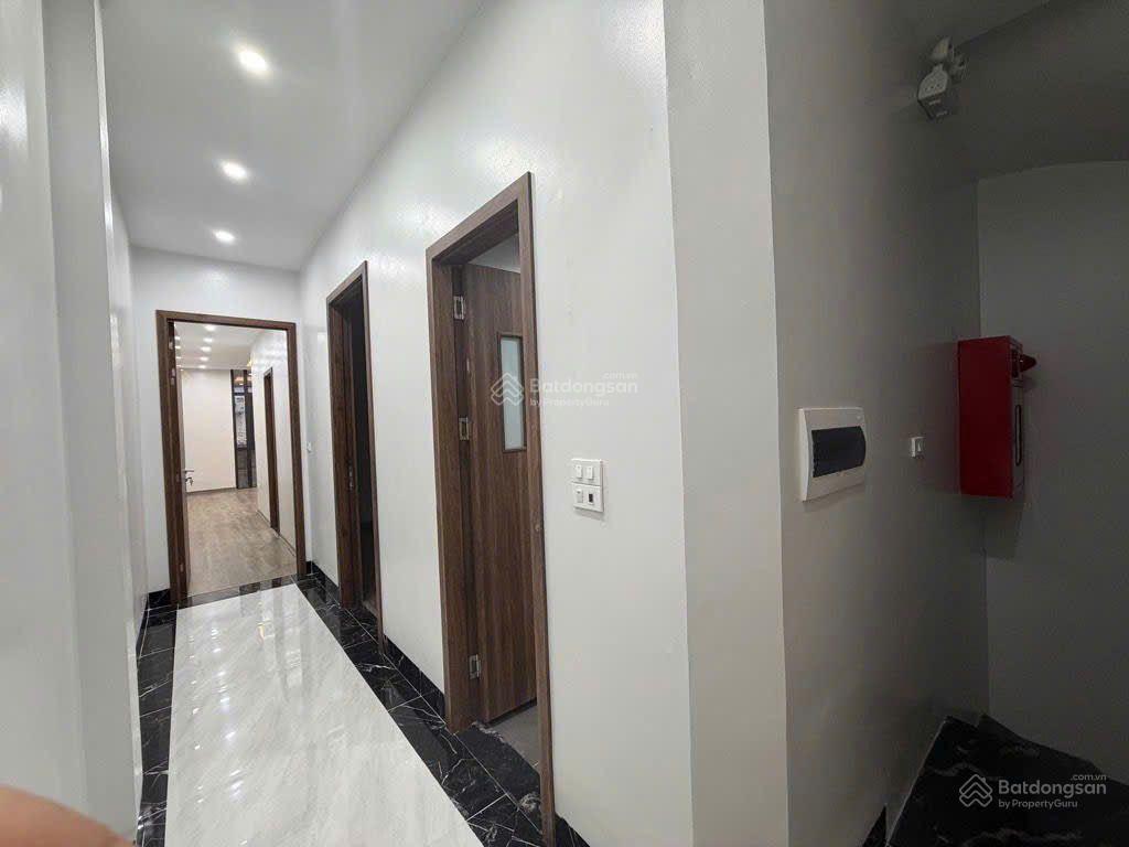 Giảm 1 tỷ  70m trần duy hưng  7 tầng + 1 tum  thang máy mặt tiền 4,5m ô tô vào nhà, kd đỉnh