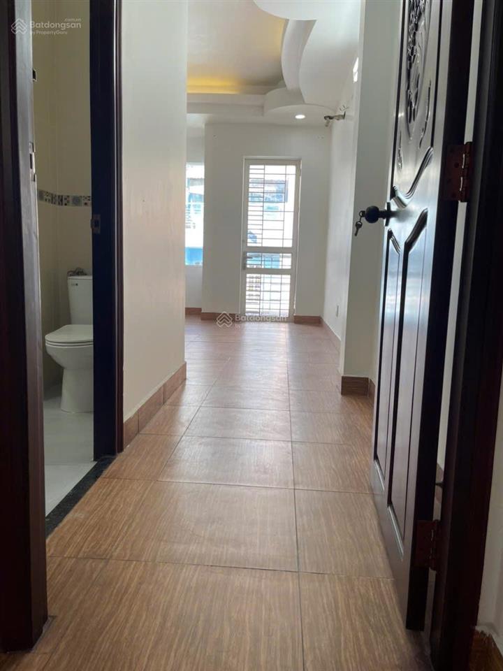 Nhà 6 tầng đúc, mới đẹp, 4m x 20m, 6pn, 5wc, 2 chiếc ôtô đậu trong nhà, mt đường 12m c/x phú lâm b