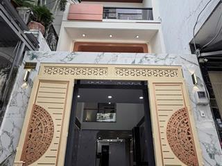 Nhà mới 4x16m 1 trệt lửng 2 lầu st 4pn 5wc hẻm xe hơi nguyễn hữu tiến