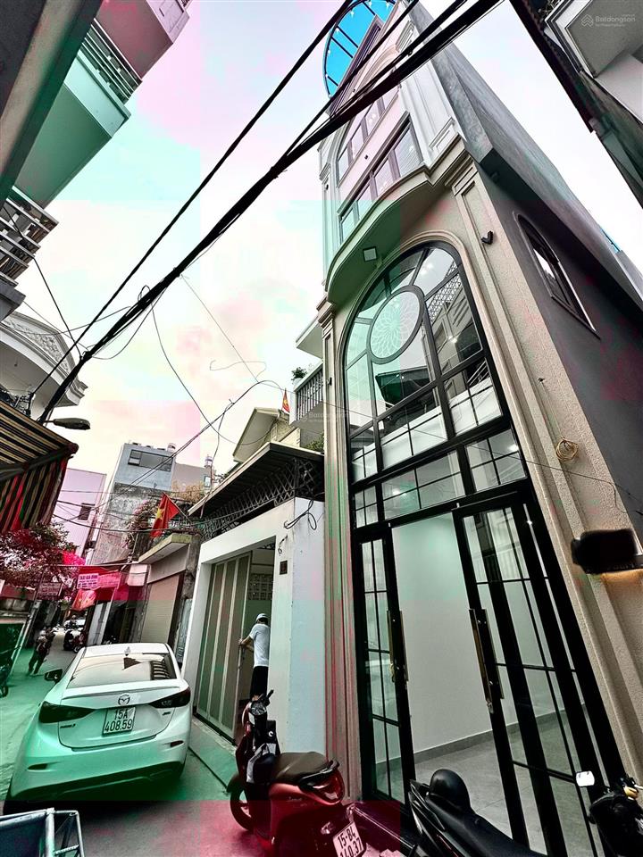 Nhà 5 tầng thang máy mặt ngõ hồ sen  ô tô vào trong ngõ