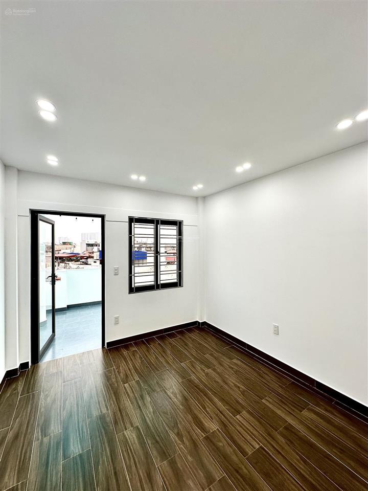 Nhà 5 tầng thang máy mặt ngõ hồ sen  ô tô vào trong ngõ