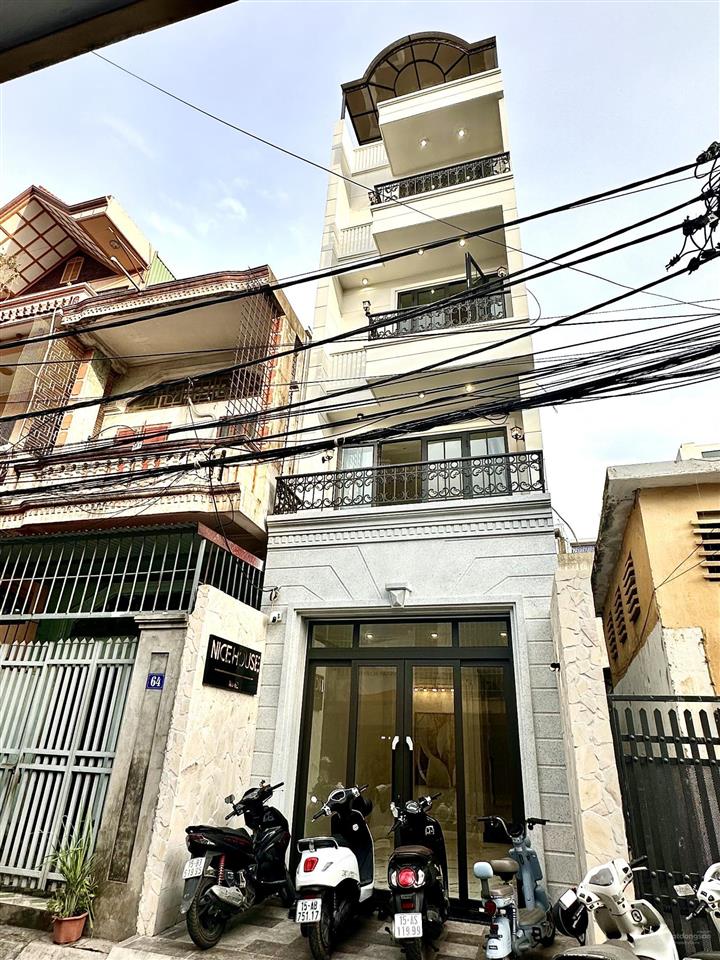 Mặt đường 5 tầng thang máy tuyến 2 hoàng minh thảo  có phòng ngủ tầng 1 cho người lớn tuổi